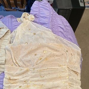 Super cute dressy top with stars by Torrid in EUC. Also selling matching skirt.